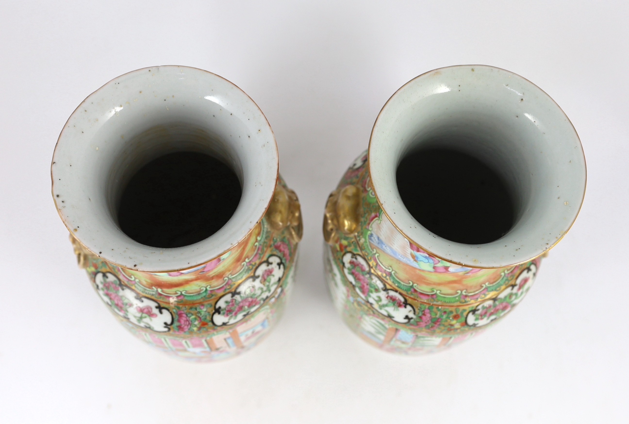 A pair of Chinese famille rose vases, 19th century, 36.5 cm high